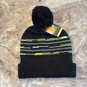 Black and green geometric winter pom pom hat